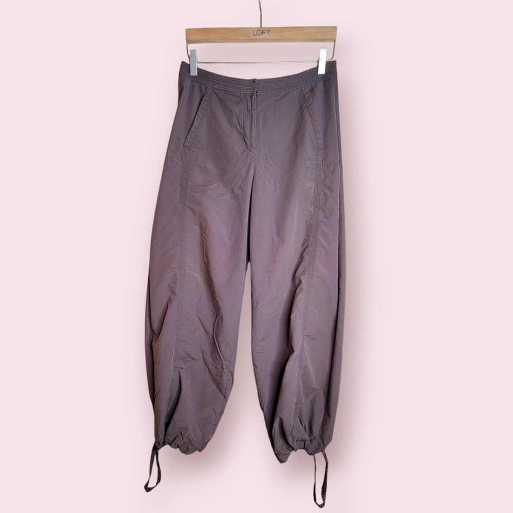 Parachute pants with floral embroidery
